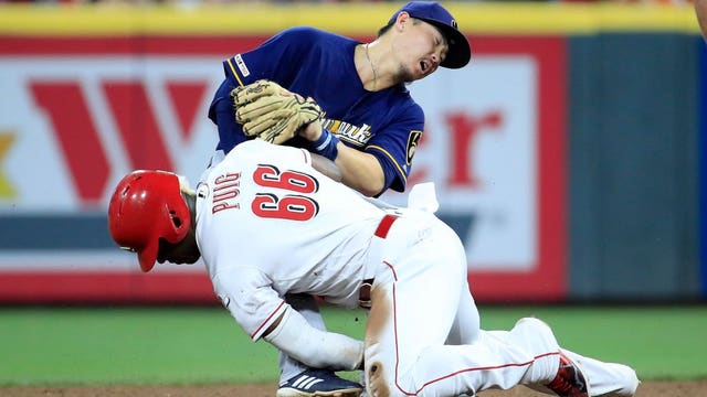 Yelich hits 31st homer; Reds beat Brewers 5-4 in 11 innings