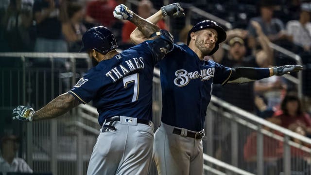 Thames' HR in 14th, Yelich's 2 help Brewers beat Nats 15-14