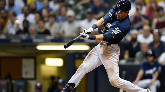 Yelich hits grand slam, Brewers power past Braves, 13-1