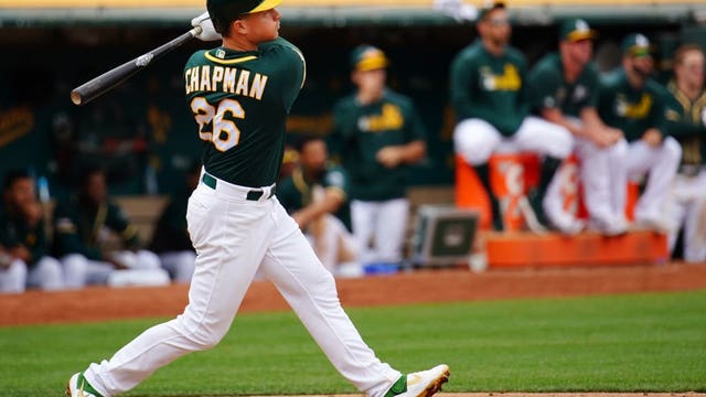 Chapman rallies A's past Brewers with two-run HR off Hader