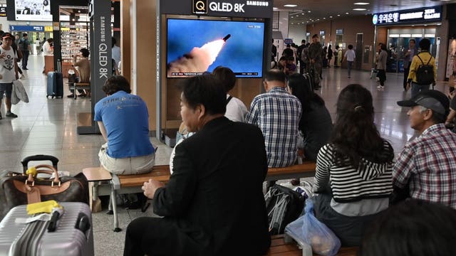 North Korea fires 2 projectiles after offering talks with US