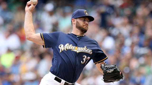Houser posts 10 Ks, Brewers top Rangers 3-2 for 5th straight