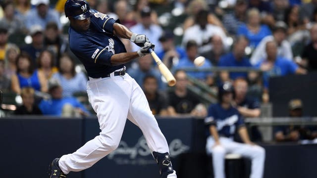 Cain HR, Brewers fan 16, beat Padres 5-1 to improve position