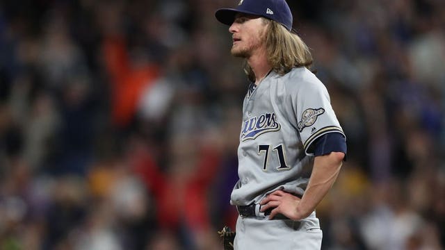 Hader tagged in 9th, Brewers lose in 10; still trail Cards