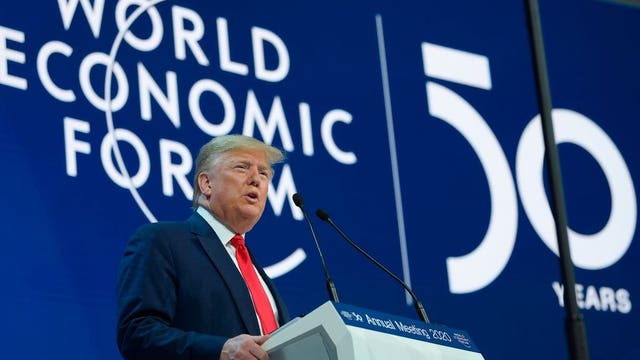 President Trump lauds US economy in Davos, says little on climate woes