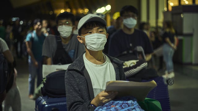 China confirms 1st death outside epicenter of viral outbreak