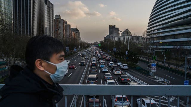 China reports major drop in new virus cases to 397