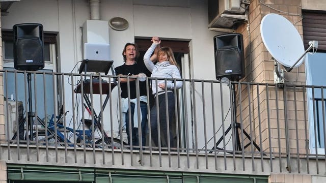 Europeans sing health workers’ praises nightly from windows