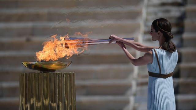 Flame arrival faces rising tension Tokyo Olympics be delayed