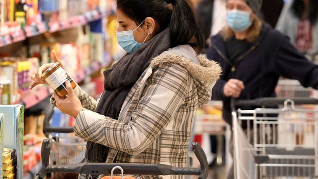 Amid virus, White House warns Americans to avoid going out — even to grocery stores, if possible