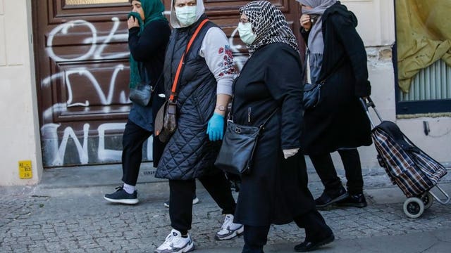 When to ease lockdowns? Nations offer wide mix of solutions