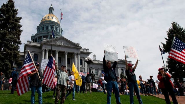 Man arrested on way to lockdown protest will remain detained