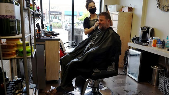 3 states partly reopen, despite health officials' warnings