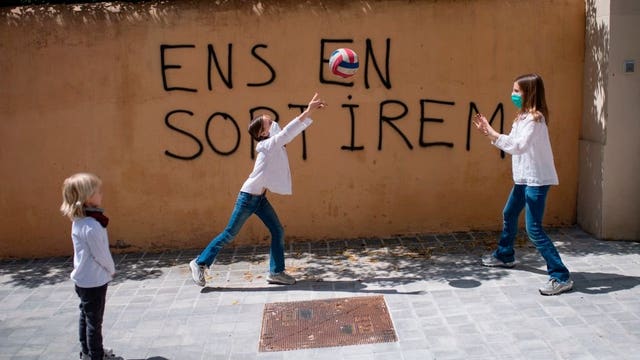 Spain lets children play as US states move at various speeds