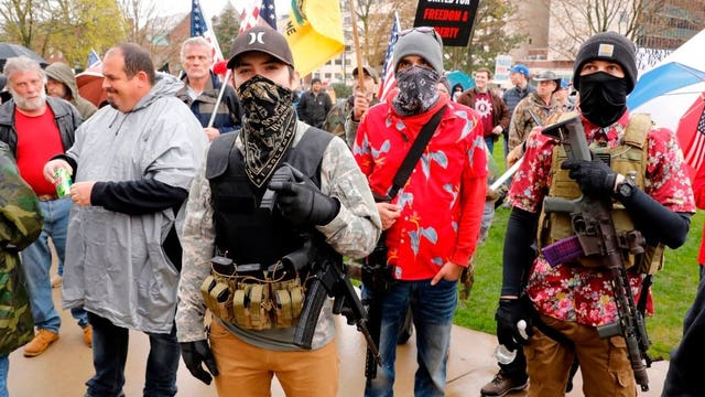 Michigan militia puts armed protest in the spotlight