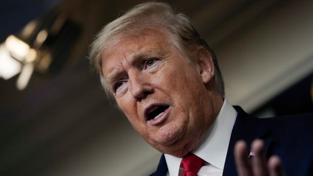 Moving past 'invisible enemy,' President Trump nudges nation to reopen