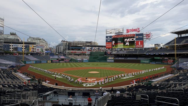 Yanks, Nats kneel in Black Lives Matter salute; Fauci's toss