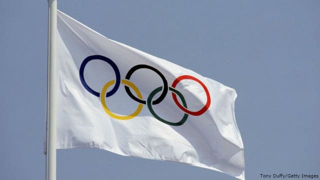 IOC: Russians can compete at Olympics, but without flag