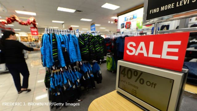 "My list keeps growing:" Retailers work to woo shoppers with in-store deals; online shopping spikes