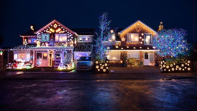 Enjoyable at a distance, holiday lights brighten dark times