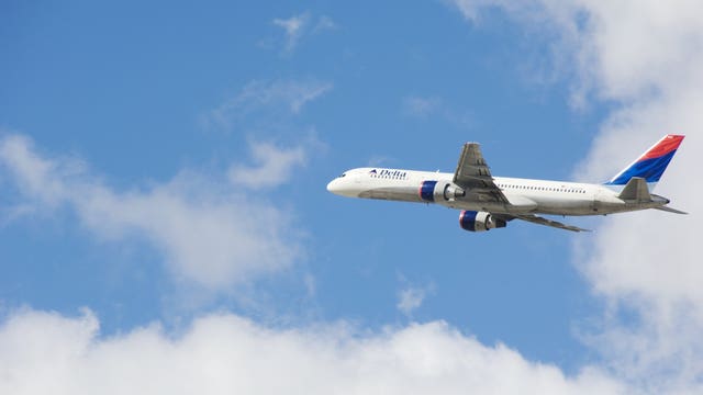 Airlines slash flights, freeze hiring as virus cuts travel