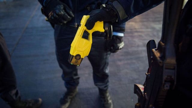 France swaps chokehold for stun guns after police protests