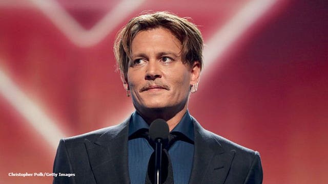 Johnny Depp is in a feud with his ex-managers, but why?