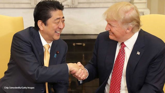 Pres. Trump welcomes Japan's prime minister with warm embrace
