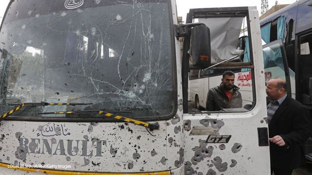 Twin blasts kill 40 near religious sites in Syria's capital