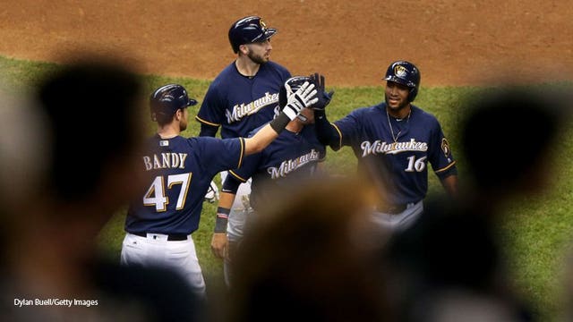 Santana hits 2 HRs; Brewers top Braves, 4-3