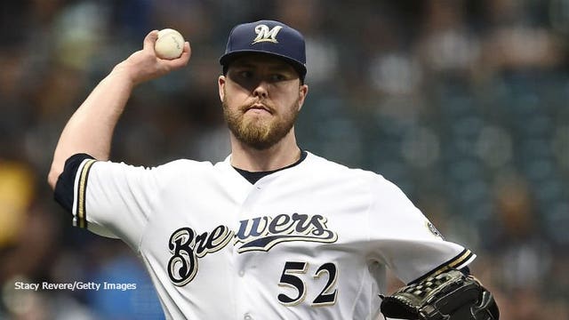 Aguilar's 2-out hit backs Nelson as Brewers beat Giants 6-3