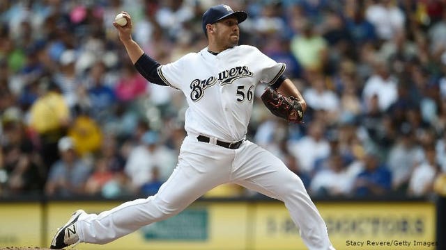 Giants get 4 in 10th, hold on for wild 9-5 win over Brewers