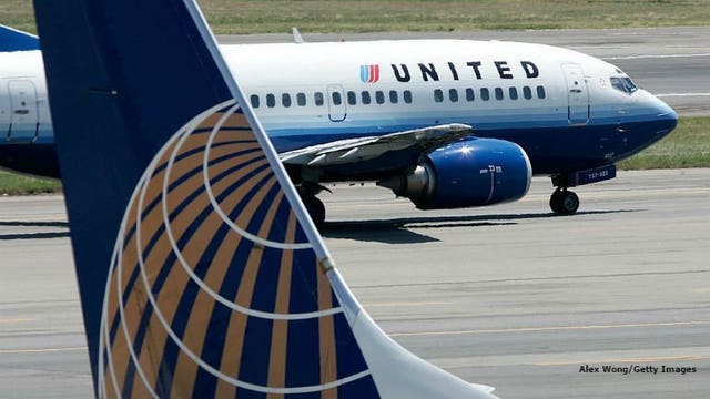 United pledges to review policies on removal of passengers