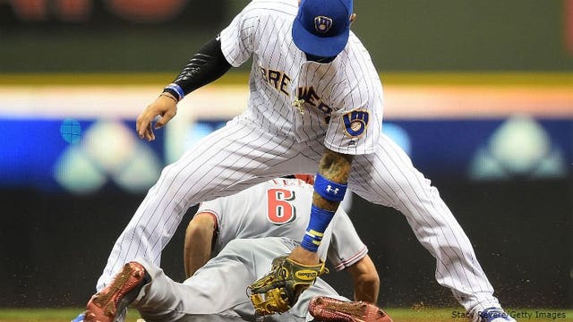 Reds build early lead, hang on for 11-10 win over Brewers