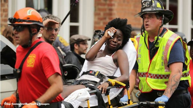 The Latest: Car strikes group at white nationalist rally