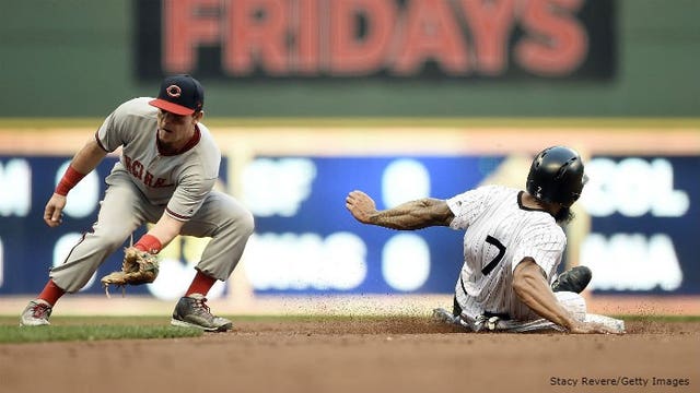 Brewers win 6-5 on wild pitch in 10th to snap losing streak