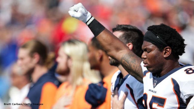 Pictures: At least 100 NFL players kneel or sit in protest