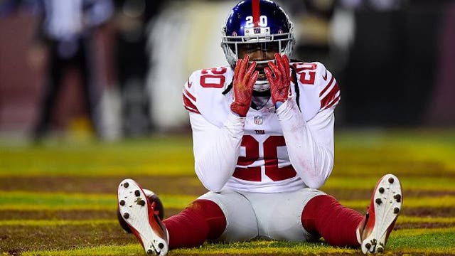 Police arrest NFL player's brother after body found at Giants star's home