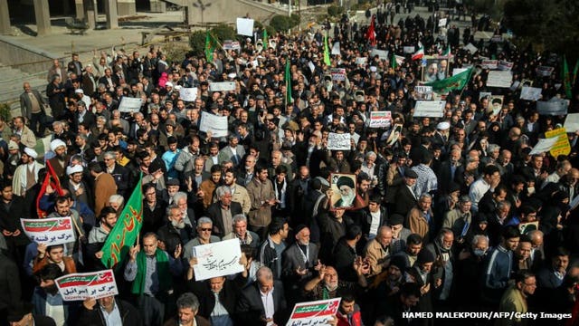 Iran hard-liners rally as new protests challenge government