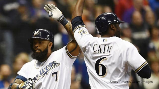 Guerra deals, Thames homers to lift Brewers over Reds 2-0