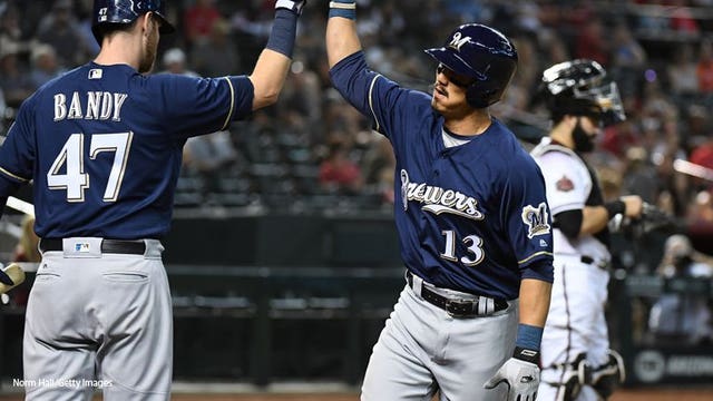 Brewers activate Tyler Saladino from DL, DFA Eric Sogard