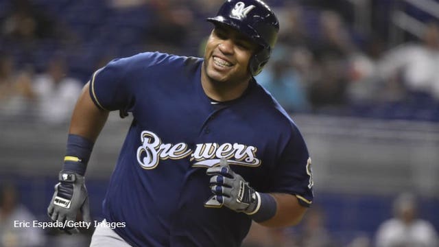 Aguilar drives in 3 but Brewers lose to Marlins 5-4 in 12