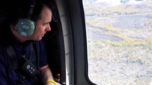Gov. Walker tours damage from wildfire in northern Wisconsin