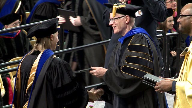 "Tears of joy:" Graduates of MU, UWM celebrate accomplishments as they walk across the stage