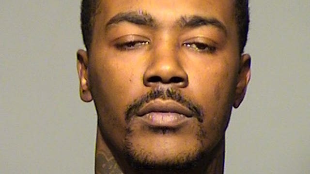 Charged: Mario Granville accused of shooting and killing two, wounding three others