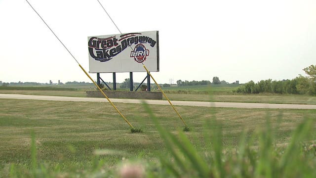 Crowds continue to flock to Great Lakes Dragaway 1 week after deadly shooting; suspect still at large