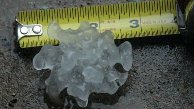 Drivers deal with ponding, huge hail, but "at least it's not snow"