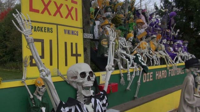 "It's worth coming out to see:" Folks get a kick out of Halloween football display, complete with 'die-hard' fans