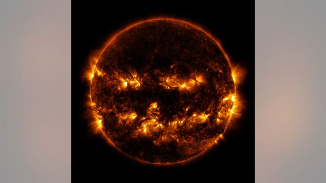 Pumpkin sun? Picture snapped by scientists shows jack-o-lantern face