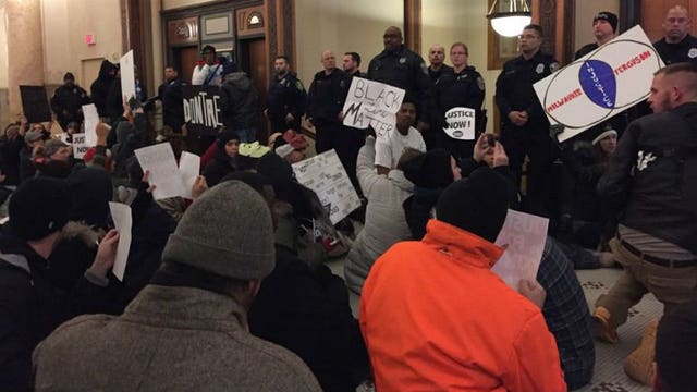Police: Protester arrested for disorderly conduct as Hamilton supporters fill City Hall